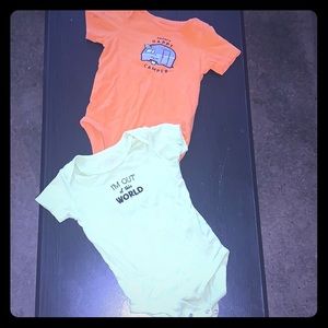 Two 18 month old onesies .